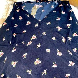 Sleeveless top with buttons